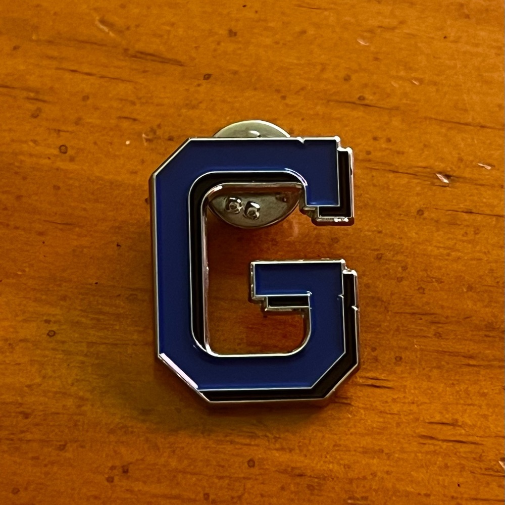 A blue capital letter G.